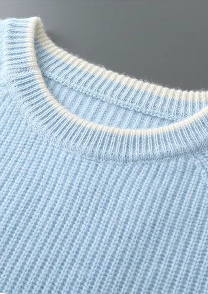 Menswear: front view of a versatile ribbed crew neck sweater on a male model.