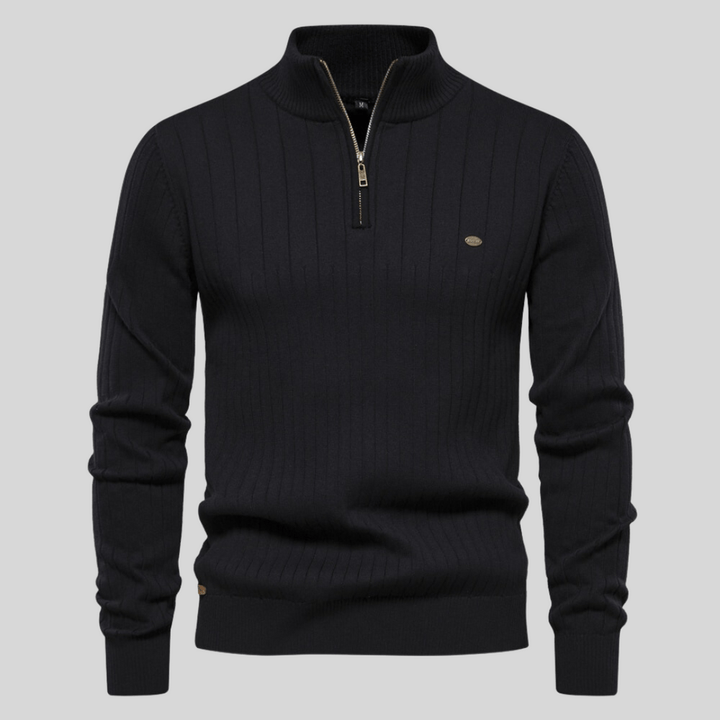 Modern men's long sleeve sweater with a stylish ribbed mock neck and functional half zip closure.
