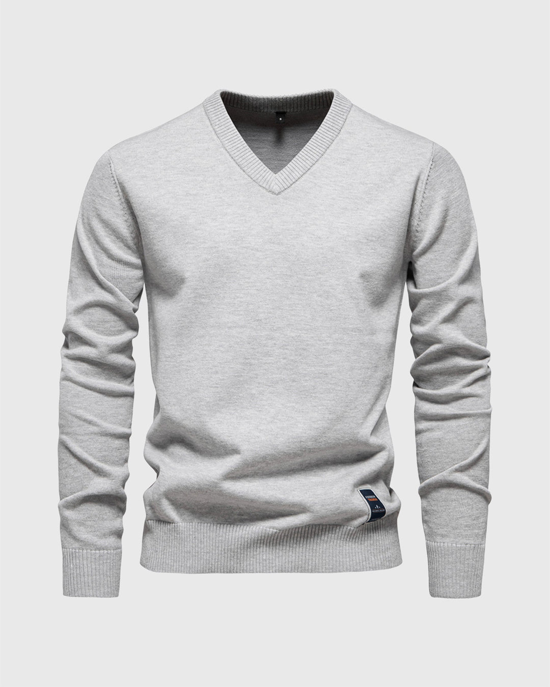 Slim fit men's V-neck ribbed sweater, long sleeve, ideal for a smart casual outfit.