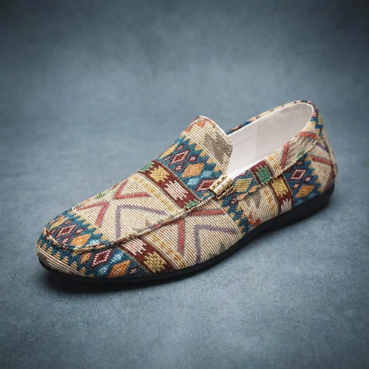 Comfortable men's casual slip-on loafers, Rio model, with vibrant Aztec pattern, perfect for everyday wear.