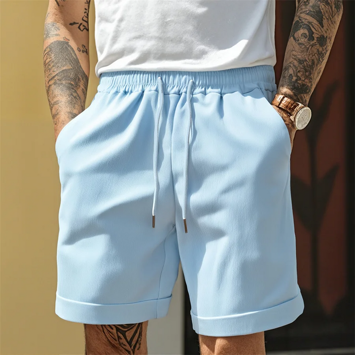 Men's Riviera cuffed shorts, relaxed fit, adjustable waist. Perfect for summer casual wear.