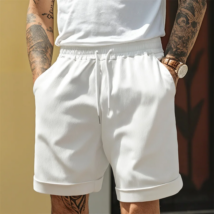 Comfortable men's Riviera cuffed shorts with adjustable waist. Versatile for smart casual or summer outfits.