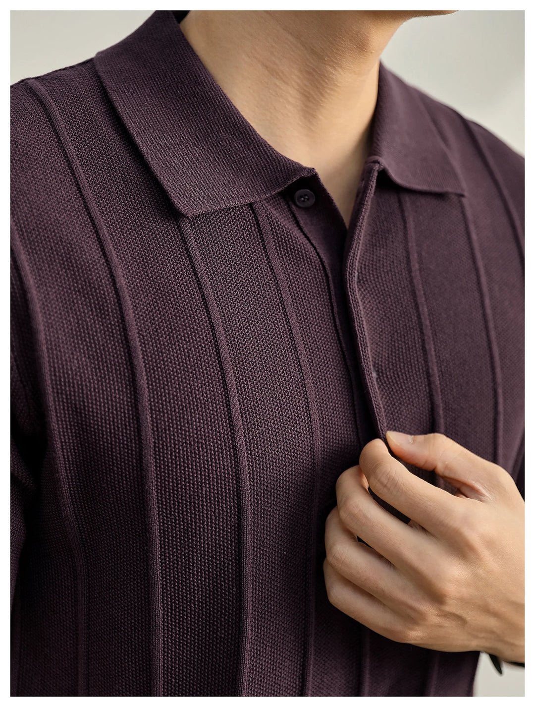 Black slim fit polo shirt, textured knit and comfortable for daily wear.
