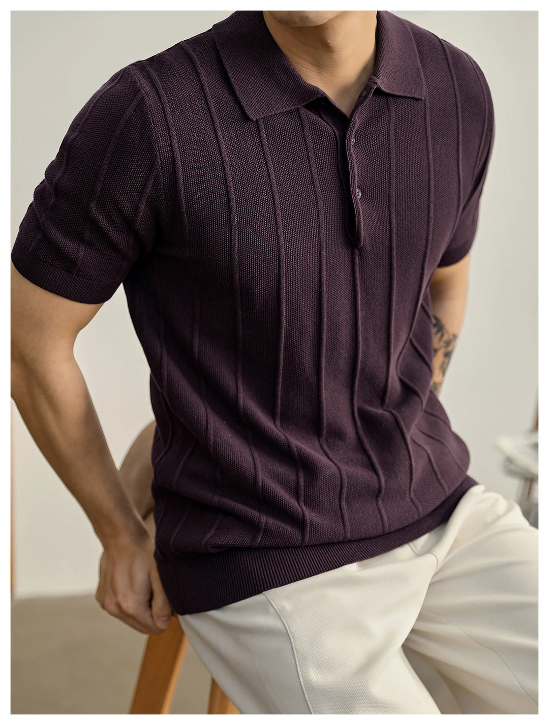 Burgundy men's polo, buttonless design, luxurious textured knit, comfortable.