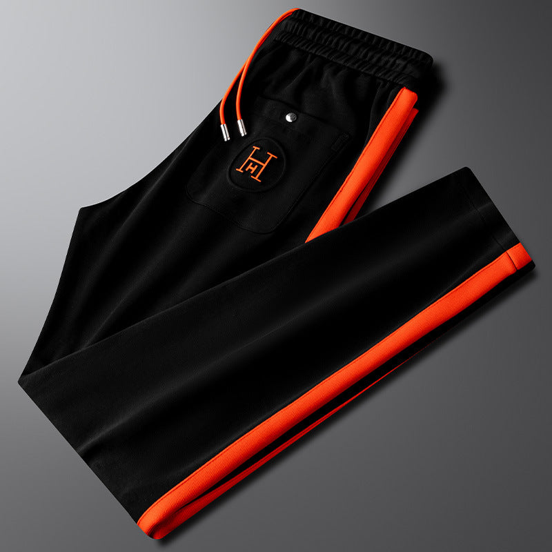 Detailed view of the Riviera track pants, emphasizing comfort and leisure wear design.