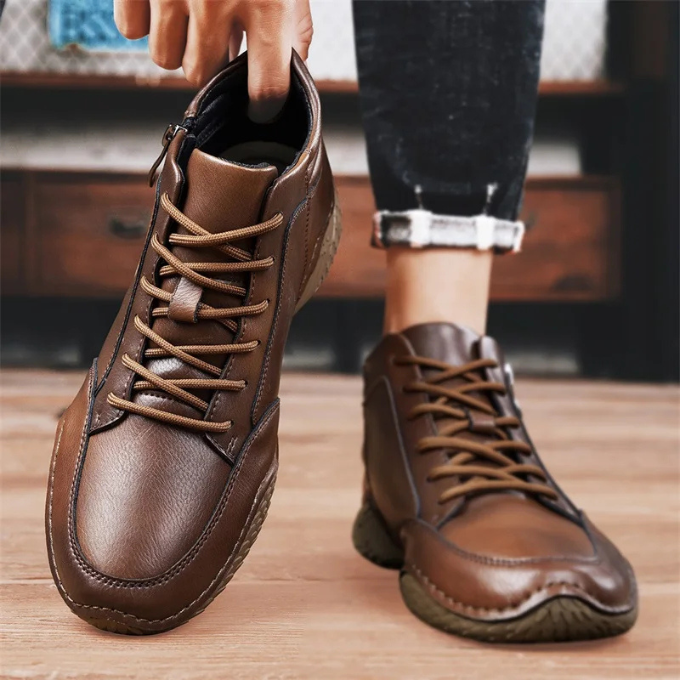 Men's fall/winter ankle boots, dark brown, designed for rugged terrain with anti-slip sole.