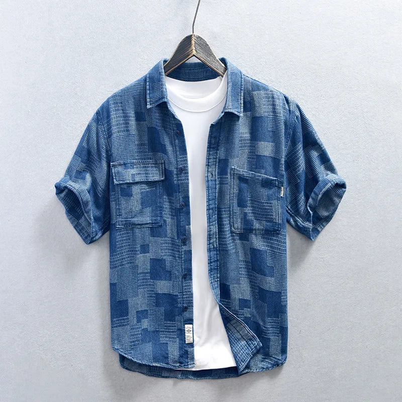 Men's rugged blue button-up long-sleeve shirt. Multi-pocket design, perfect for casual, stylish everyday wear.