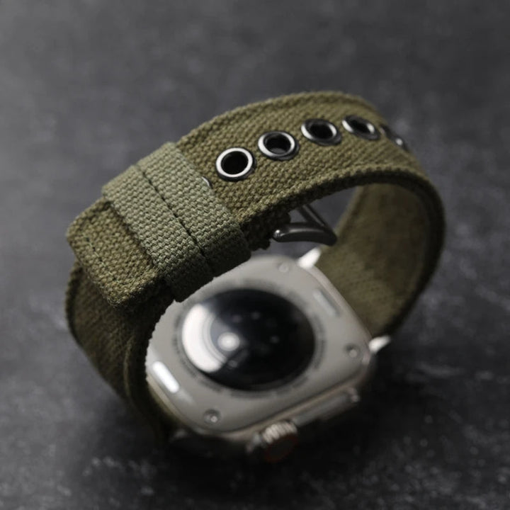 Tough men's smartwatch band, black canvas, adventure-ready, sport accessory.