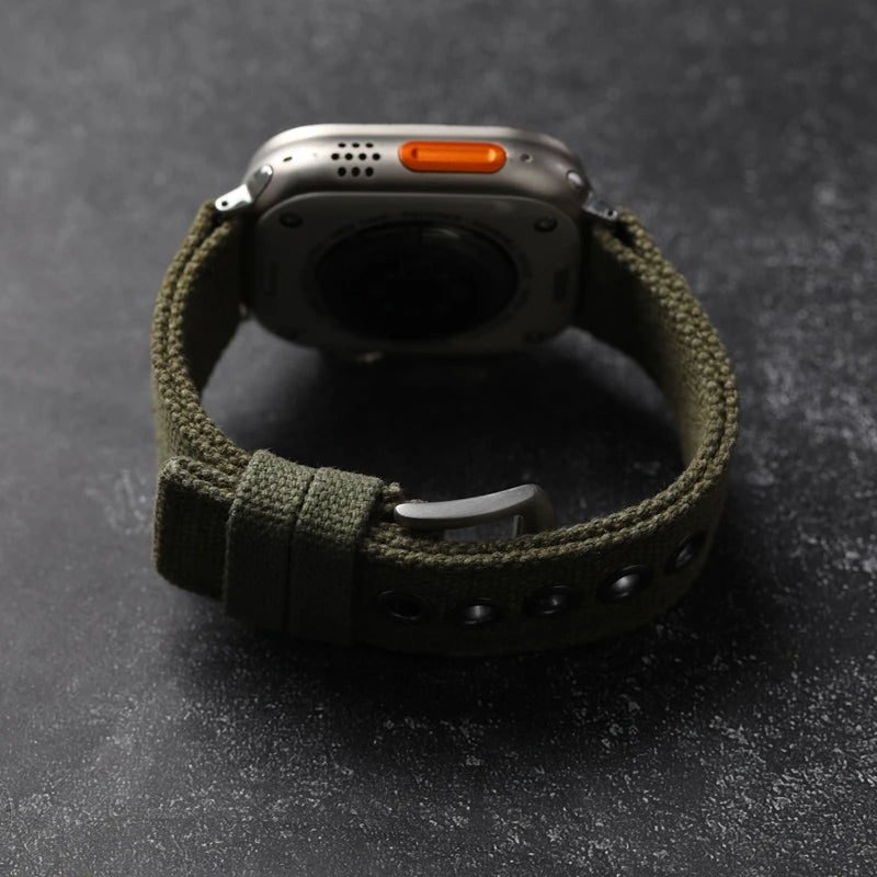 Rugged men's watch strap, durable canvas, ideal for outdoor activities & sports.