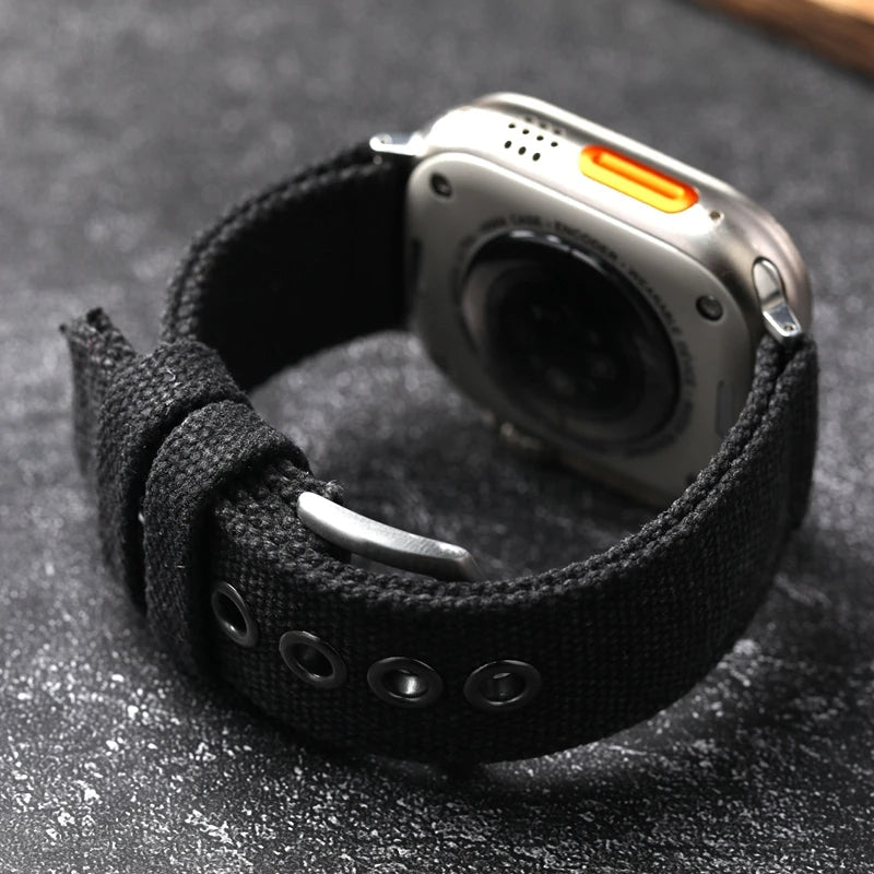 Adventure-ready men's smartwatch band, tough canvas, perfect for outdoor gear.