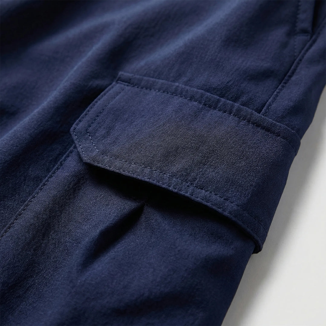 Durable men's utility shorts with multi-purpose pockets, perfect for outdoor activities & active wear.