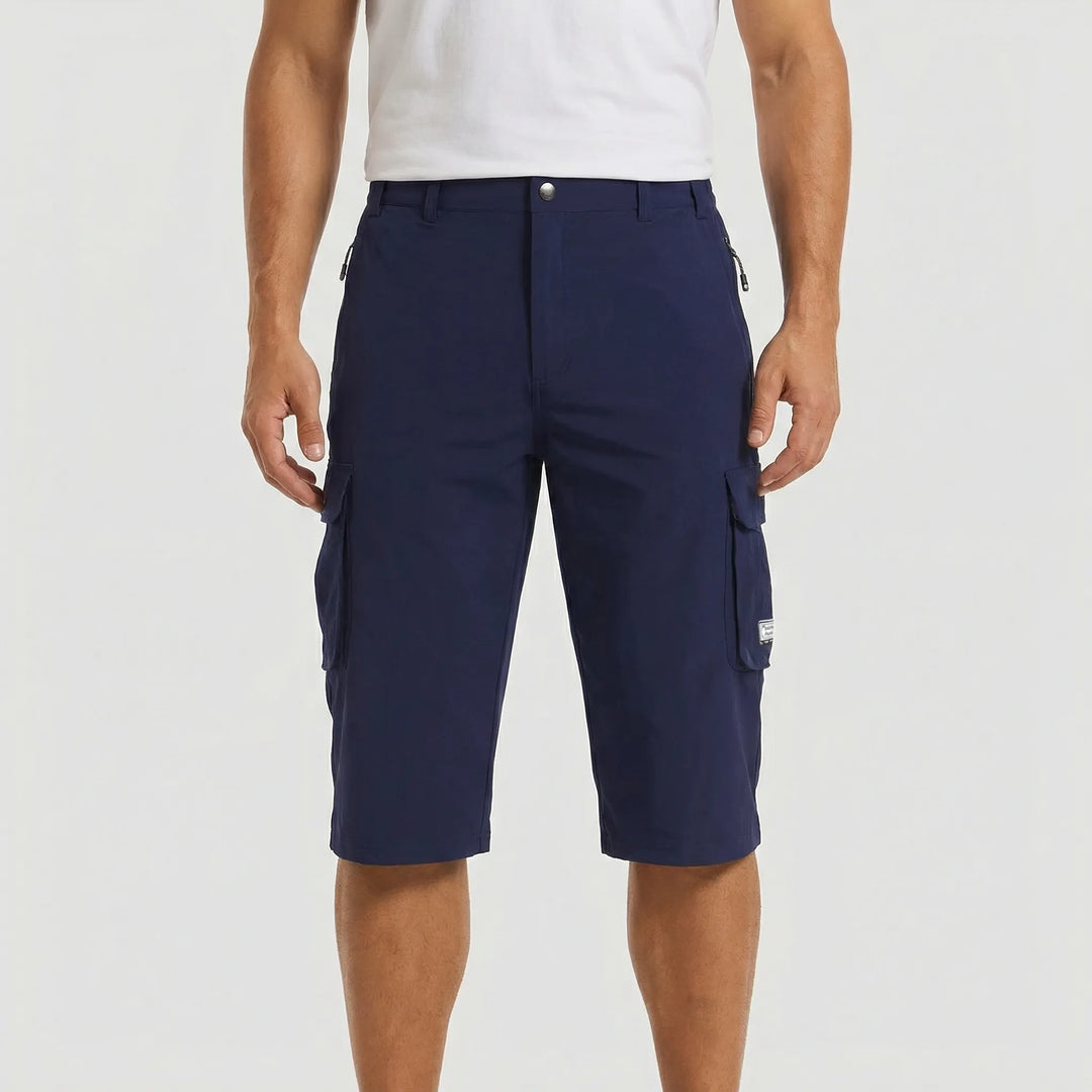 Relaxed fit men's cargo shorts with ample storage from deep side pockets, great for casual summer style.