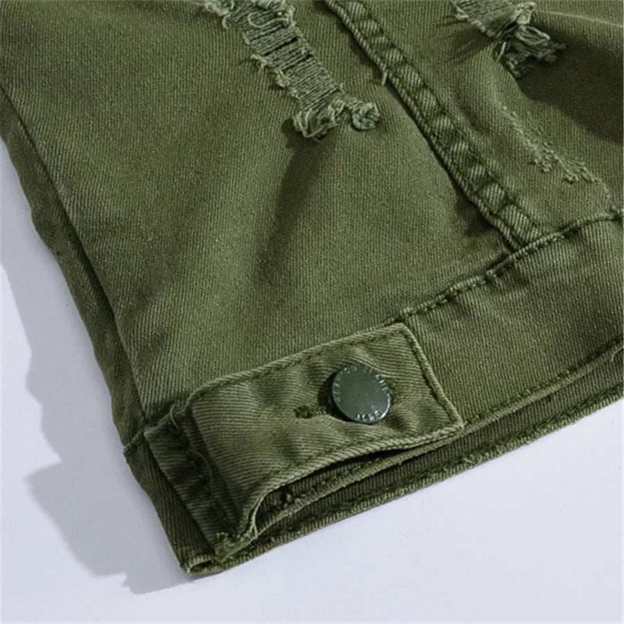 Detailed view of a rugged men's denim vest, highlighting its texture, raw edge, and bold street style.