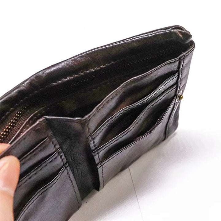 Men's vintage-inspired bifold wallet, constructed from robust distressed leather.