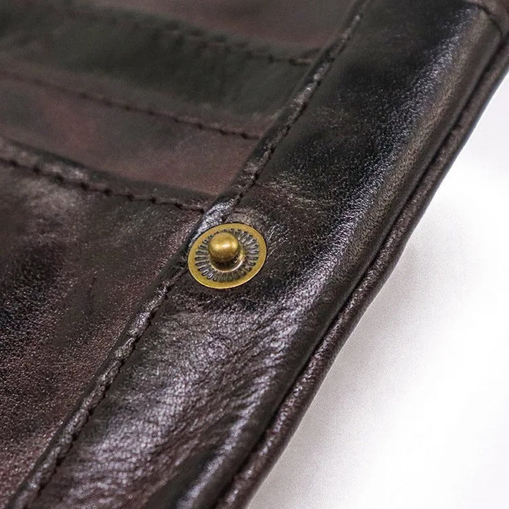Classic men's bifold wallet in distressed leather, offering a timeless vintage aesthetic.