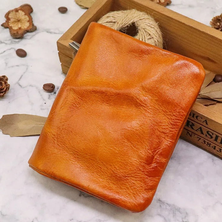 Distressed leather bifold wallet for men, highlighting its unique rugged finish & practical design.