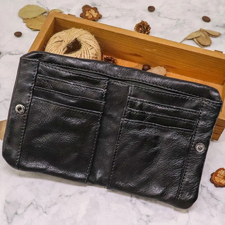 Sophisticated men's bifold wallet in distressed leather, blending style with utility.