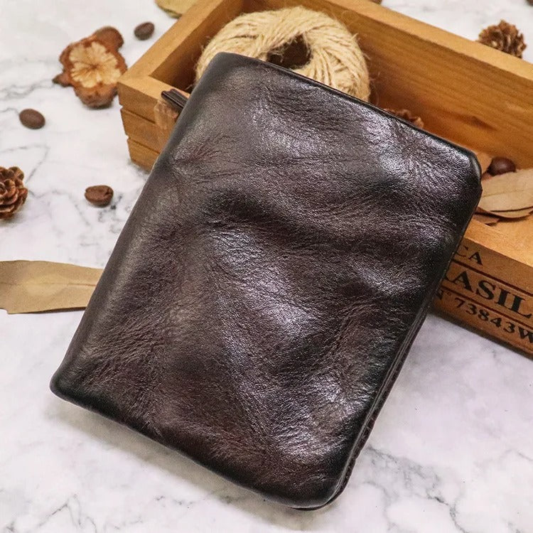 Vintage style men's bifold wallet in genuine distressed leather for everyday carry.