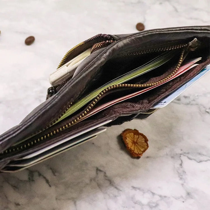 Stylish men's bifold wallet, crafted from authentic distressed leather for a vintage look.