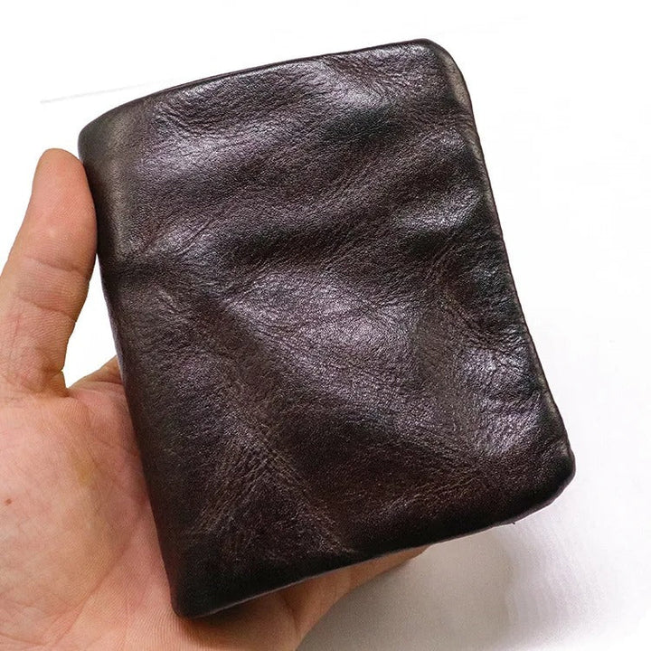 Premium distressed leather bifold wallet for men, combining ruggedness with vintage charm.