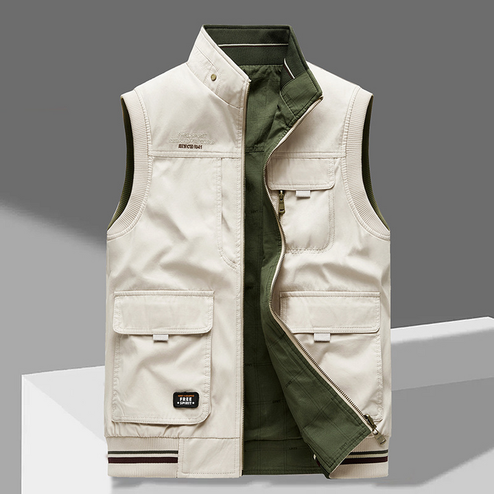 Stylish men's durable cotton outdoor vest with multiple utility pockets. Perfect for rugged casual wear & layering.