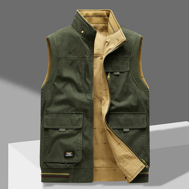 Functional men's multi-pocket outdoor vest, made from durable cotton. Ideal for utility, casual wear, and layering.