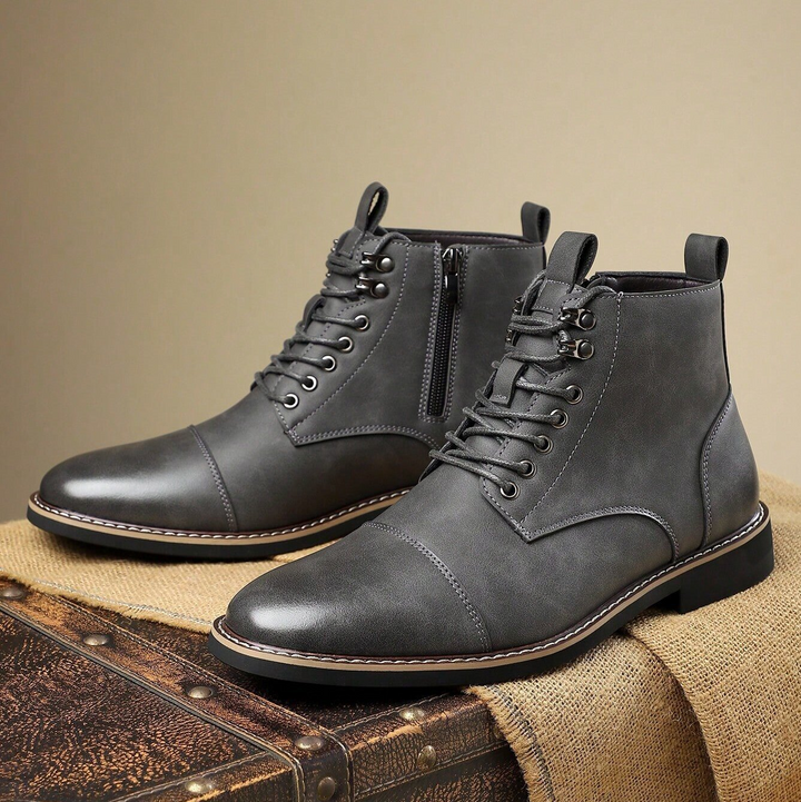 Side view of men's versatile outdoor shoes, offering ankle support & rugged protection.