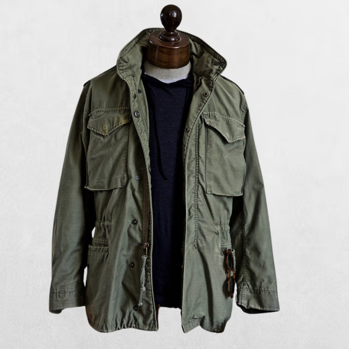Men's rugged outdoor field jacket with a hood, perfect for casual wear. Features durable fabric & storm flap.