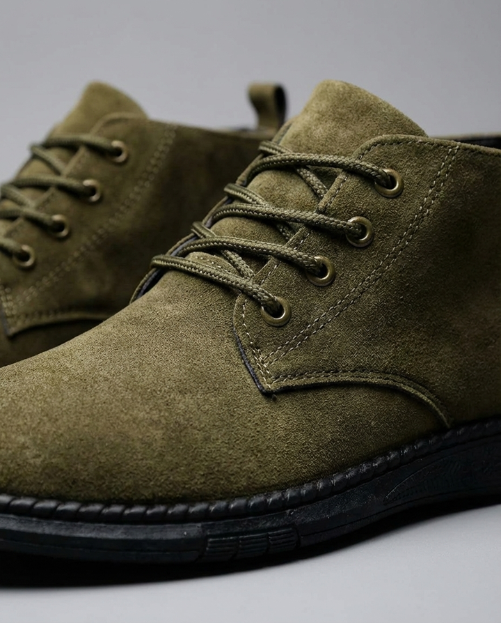 Olive green men's suede leather Roam boots, perfect for versatile outdoor and casual styling. Rugged and durable.
