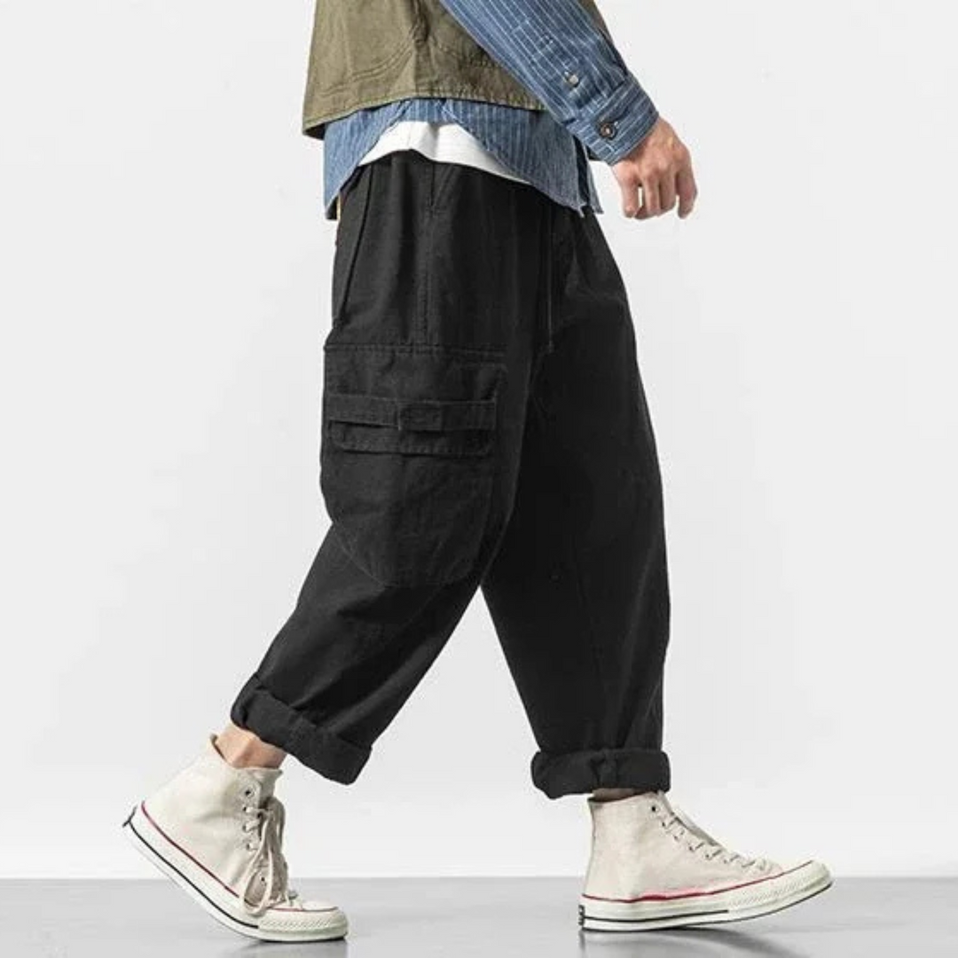 Comfortable men's relaxed fit cargo pants, soft cotton, rugged utility design for casual fashion.