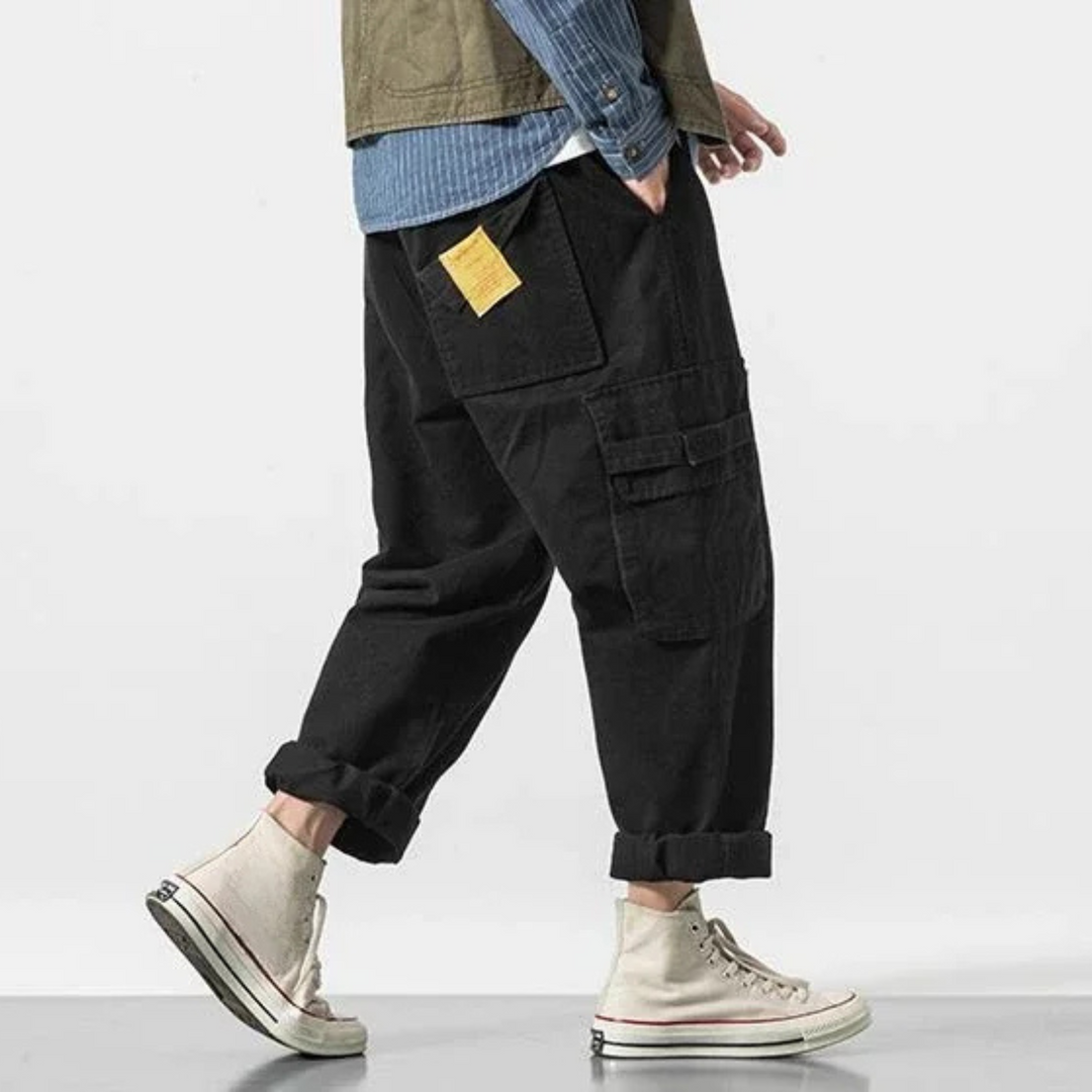 Men's cotton cargo pants, rugged utility style, relaxed fit for streetwear and casual everyday fashion.