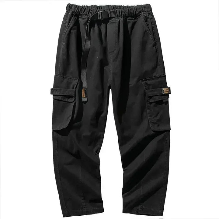 Versatile men's rugged utility pants, cargo pockets, relaxed fit cotton for casual & streetwear outfits.