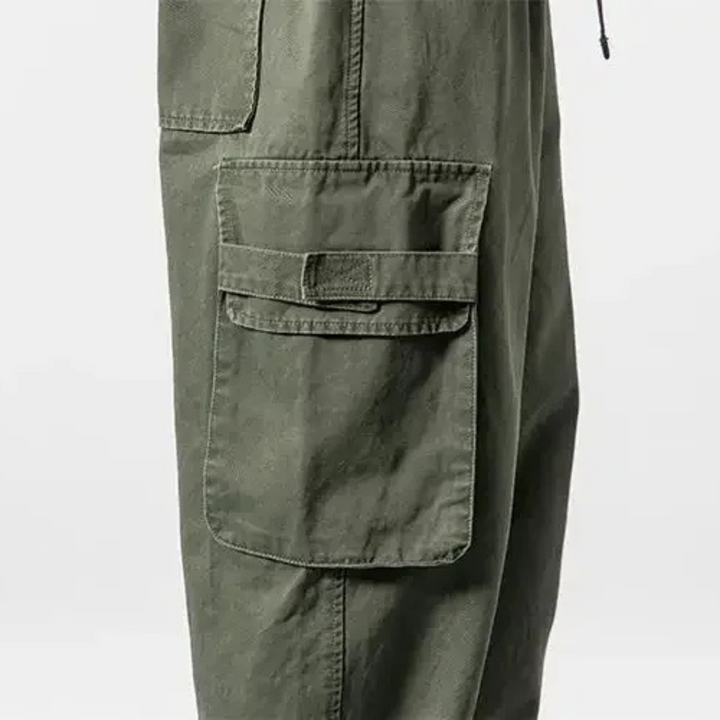 Olive men's rugged utility cargo pants, relaxed fit cotton for casual streetwear & daily fashion.