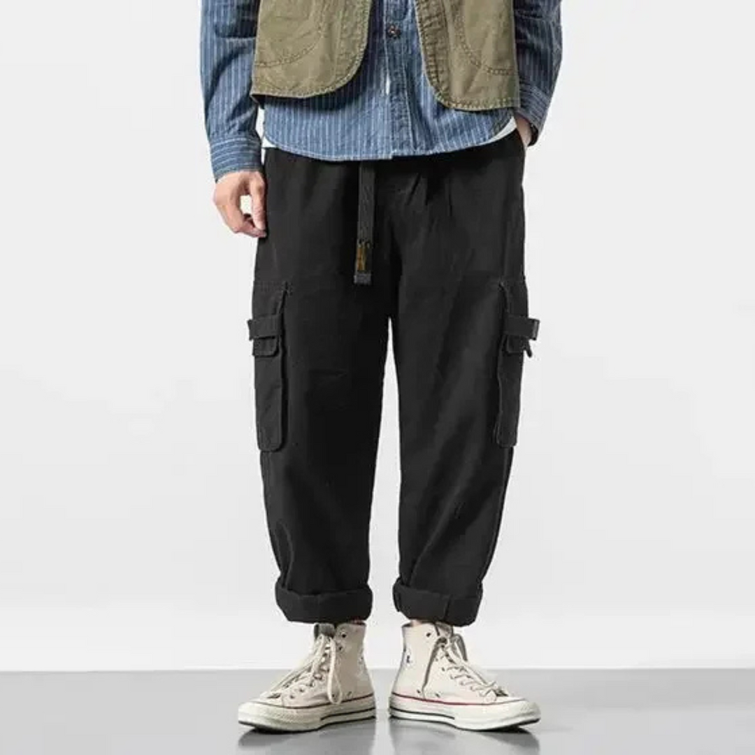 Heavy-duty men's rugged utility cargo pants, durable cotton, relaxed fit for lasting everyday wear.
