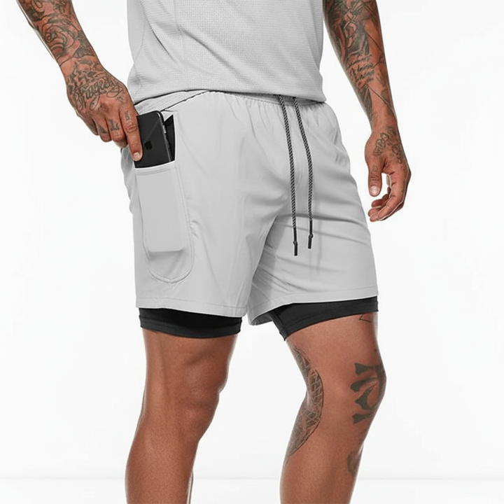 Breathable mens apparel: Dual-layer RunVibeX running shorts with phone pocket for ultimate training.