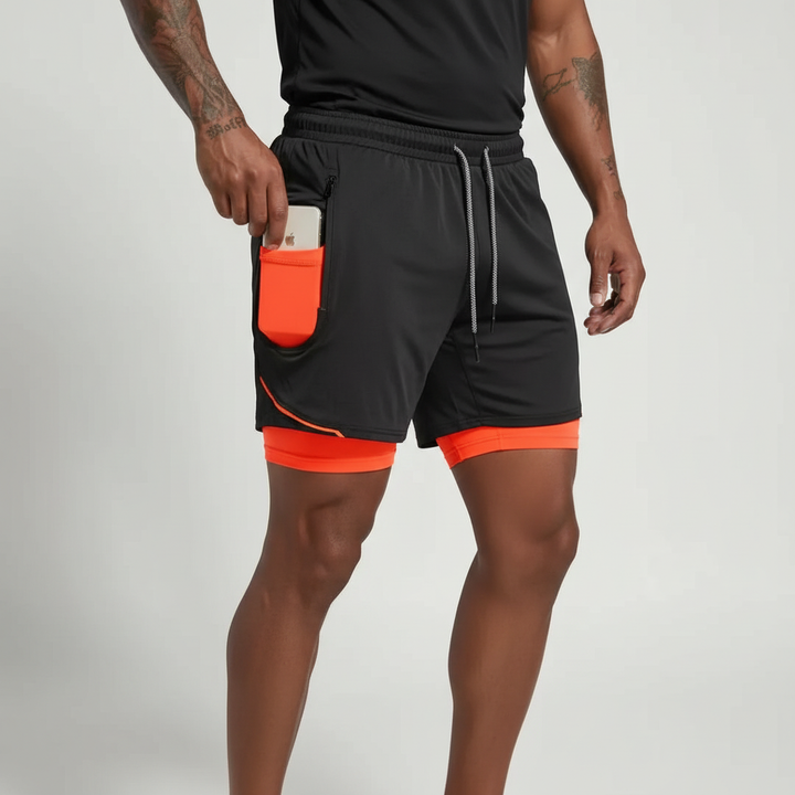 Side profile: Men's workout gear, RunVibeX running shorts showing phone pocket access & stretch fabric.