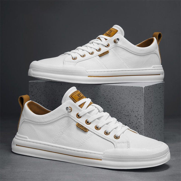 White Men's Ryde low-top sneakers, modern design & all-day comfort.