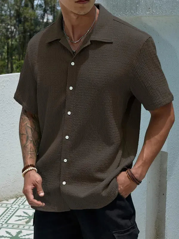 Close-up of a men's Salerno textured short sleeve shirt, showcasing the unique fabric and casual design.