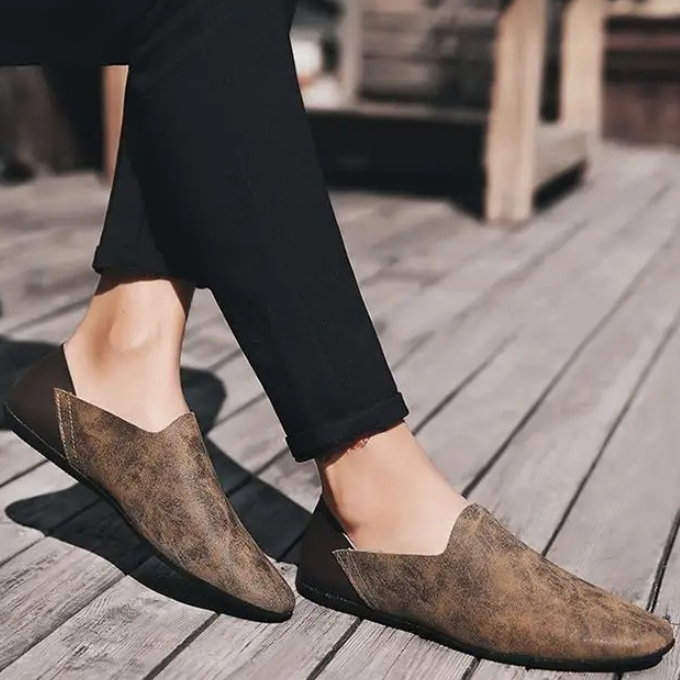 Versatile sand men's casual loafers, comfortable slip-on footwear for a relaxed daily style.