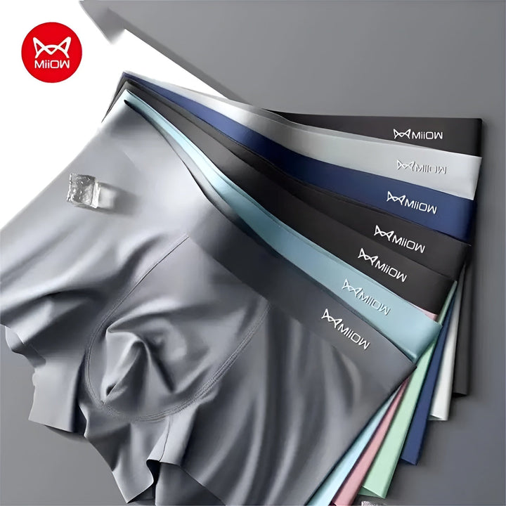 Close-up of men's seamless boxer briefs, highlighting quick-dry fabric & elastic fit.