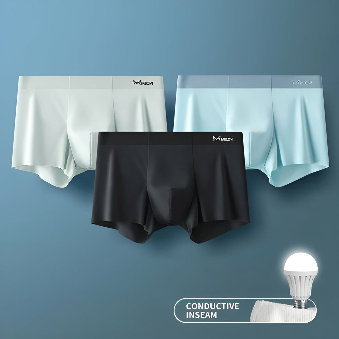 Folded men's seamless boxer briefs, emphasizing soft fabric & premium comfort.