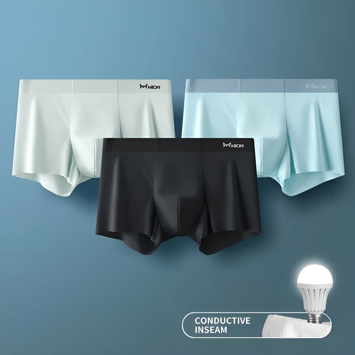 Folded men's seamless boxer briefs, emphasizing soft fabric & premium comfort.