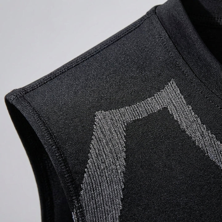 Close-up of seamless knit fabric on men's compression tank top, highlighting comfort and elasticity