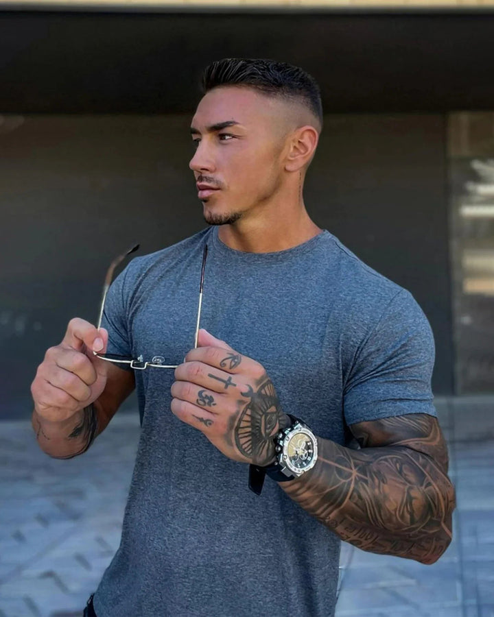 Men's Sevilla Performance Tee in black. Short sleeve activewear for gym & everyday comfort.