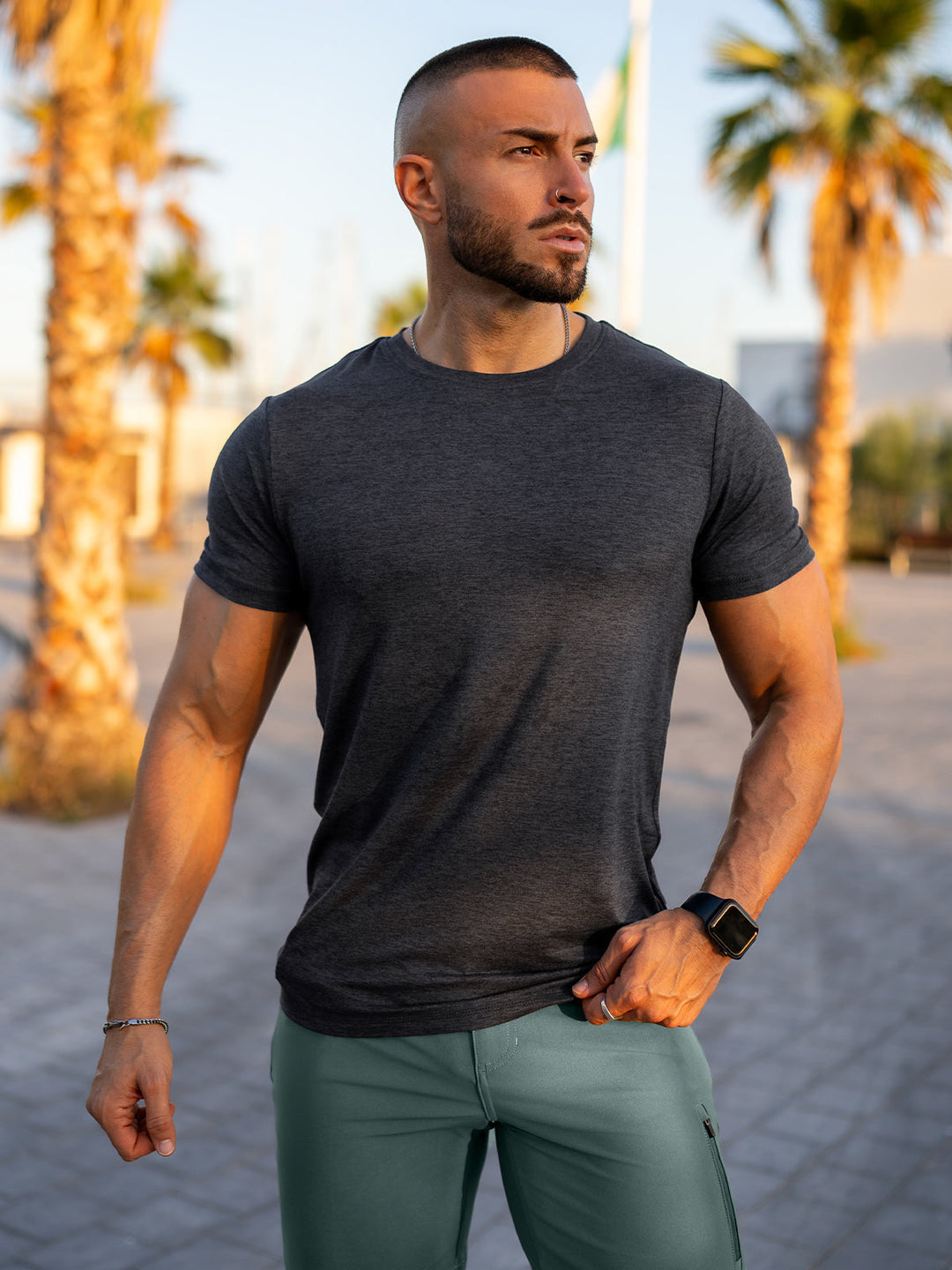 Green Men's Sevilla Performance Tee, soft and breathable athletic shirt for ultimate comfort.