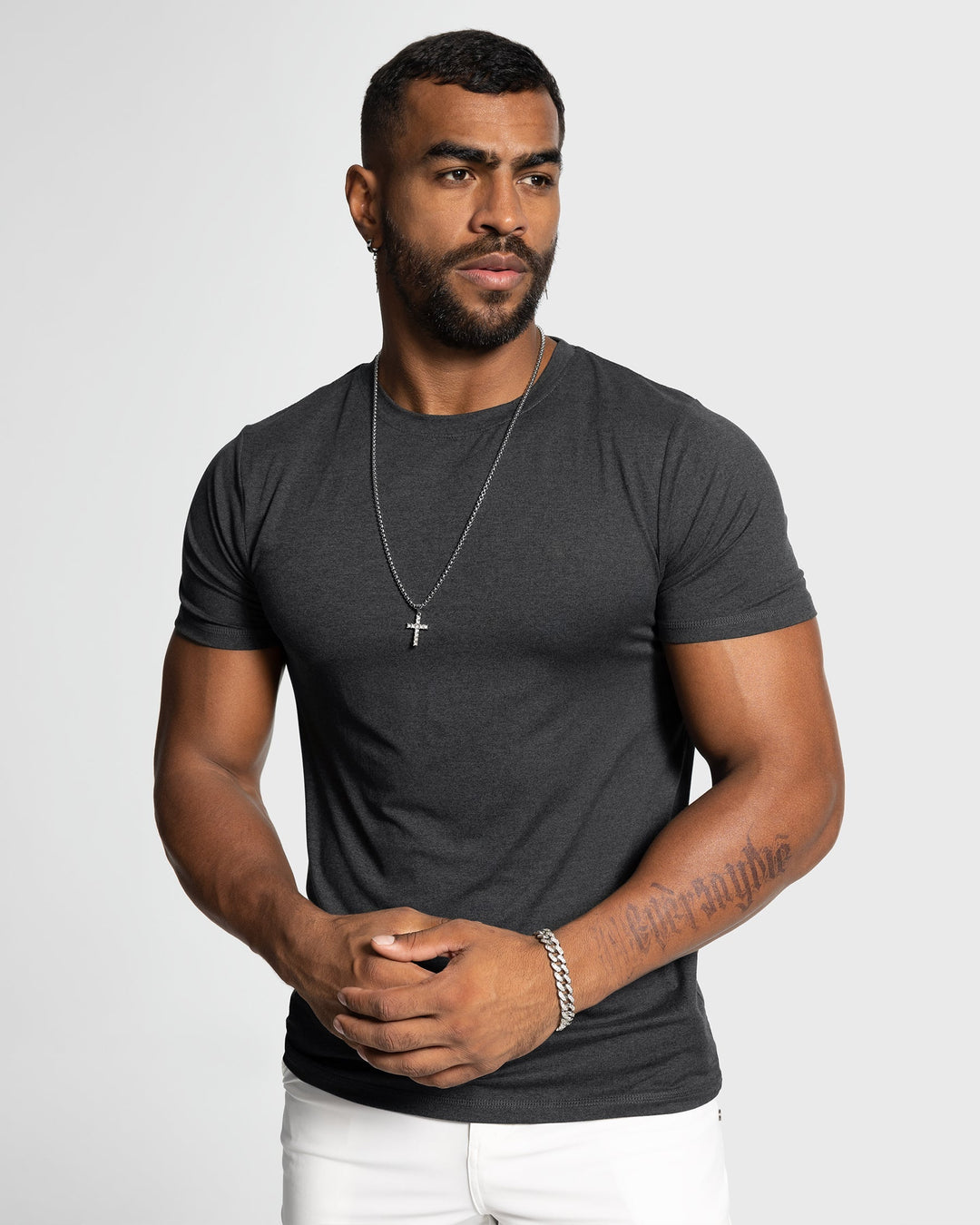 Men's Sevilla Performance Tee in various colors, ideal for workout & casual wear.