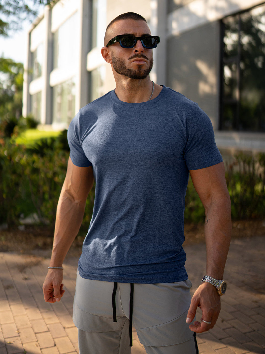 Black Men's Sevilla Performance Tee, an essential men's top for any workout or casual look.