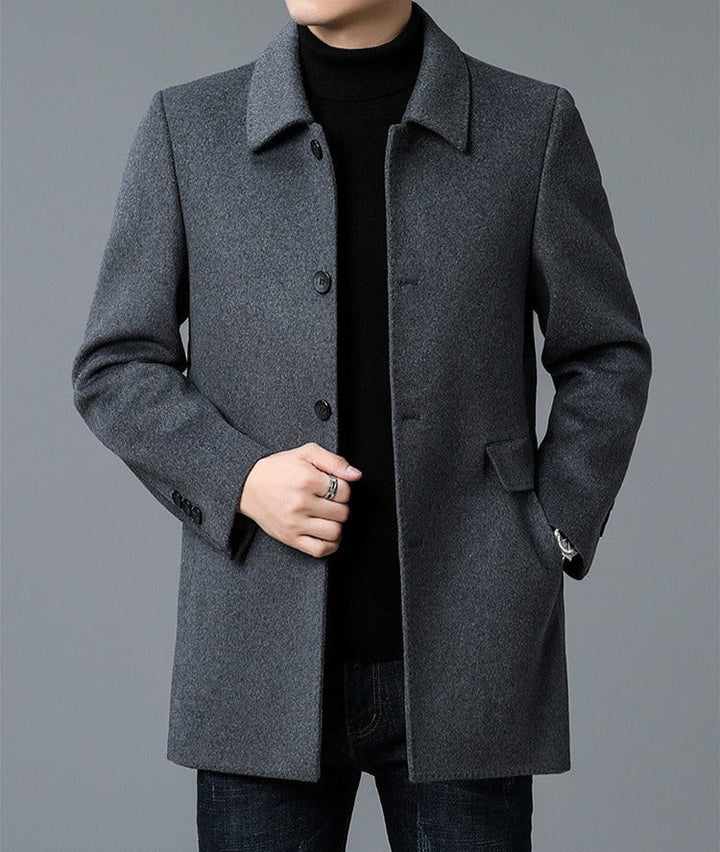 Sleek black men's tailored blazer, versatile for formal business and stylish evening wear.