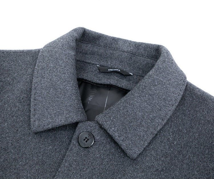 Stylish man wearing a gray tailored blazer, perfect for smart casual outfits.