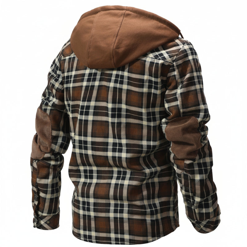 Plush sherpa interior of a men's hooded winter coat, providing supreme warmth & coziness.